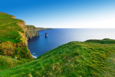Cliffs of Moher at sunset clipart