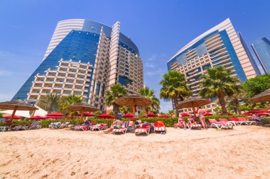 Holidays on the beach in Abu Dhabi clipart