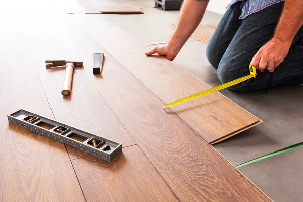 New wooden floor instalation — Stock Image New wooden floor instalation Stock Photo