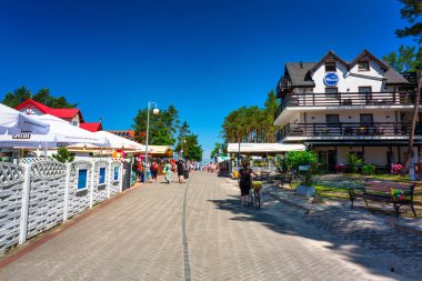 Sztutowo, Poland - Julne 23, 2022: The promenade to the beach in the seaside town of Sztutowo on the Baltic Sea, Poland