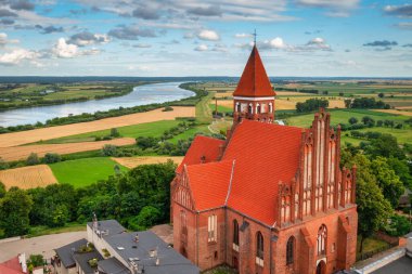Aerial view of the old town with the Teutonic castle and the church in Nowe by the Vistula river. Poland