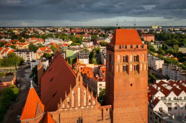 The castle and cathedral in Kwidzyn illuminated by the setting sun, Poland