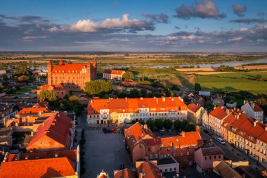 Gniew town with the Teutonic castle in the light of the setting sun. Poland