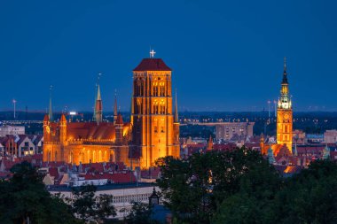 The Basilica and the Main Town Hall of the Gdansk city at dusk. Poland
