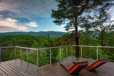Panorama of the Karkonosze Mountains in Poland at dawn.
