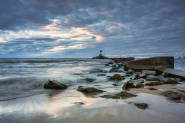 Sunset on the beach of the Baltic Sea in Gdansk, Poland