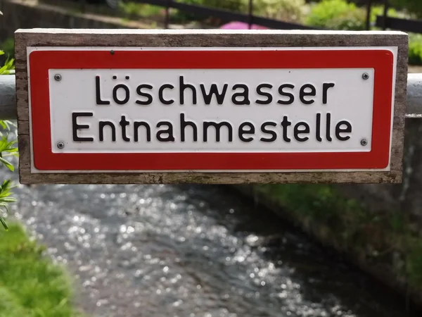 Zeichen Löschwasser int — Stockfoto