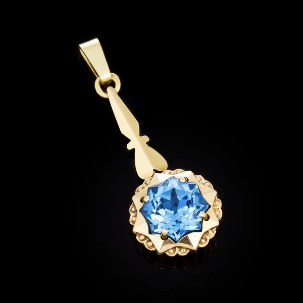 Pendentif en or avec pierre bleue — Photo