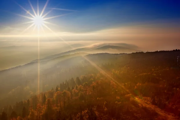 View on the sun over inversion from Jested — Stock Photo, Image