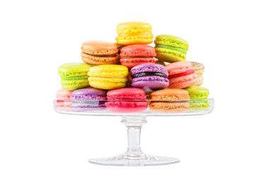 French colorful macarons in a glass cake stand clipart
