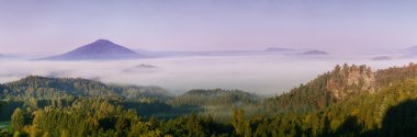 foggy dawn over the Bohemian Switzerland clipart