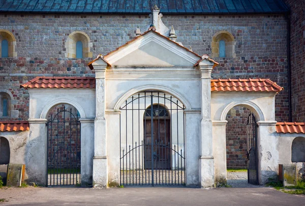 Gate of the Collegiate church in Tum — Stock Photo, Image