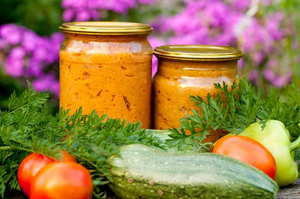 Canned vegetables zucchini in a glass jar — Stock Photo, Image