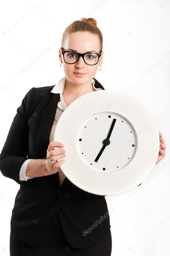 Business woman with a clock on a light background