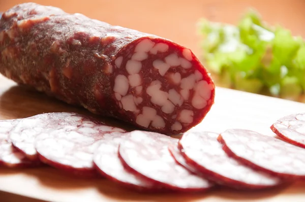 Smoked sausage, sliced — Stock Photo, Image
