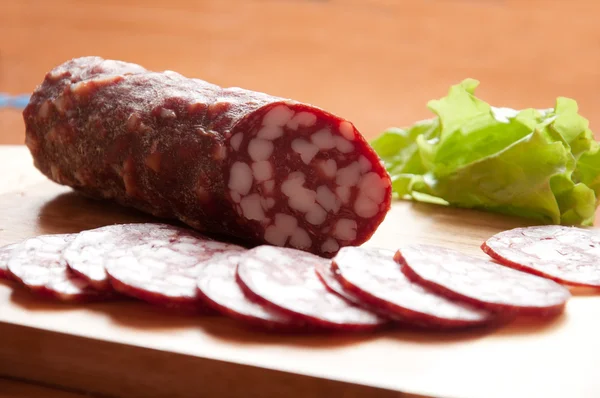 Smoked sausage, sliced — Stock Photo, Image