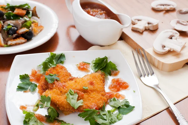 Chicken breast in breadcrumbs — Stock Photo, Image