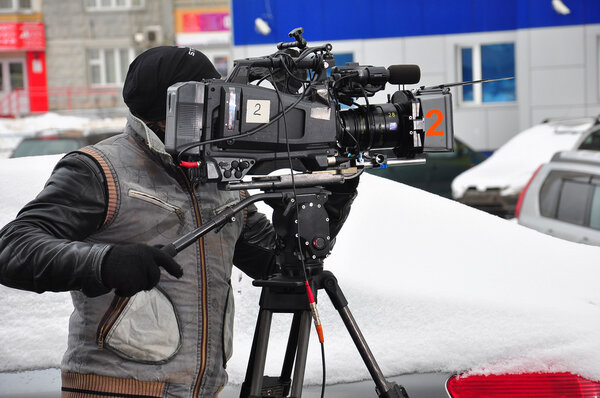 A professional videographer at work