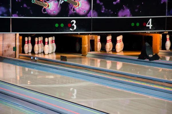 Bowling lanes with pins