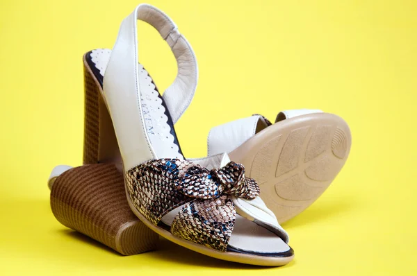 Women's summer shoes on a yellow background — Stock Photo, Image