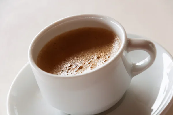 Coffee espresso in a white cup — Stock Photo, Image