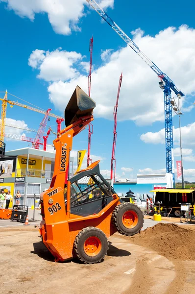 LOCUST excavator on exhibition "Construction Equipment and Technologies 2013" exhibition complex "Crocus Expo" in Moscow, Russia — Stock Photo, Image