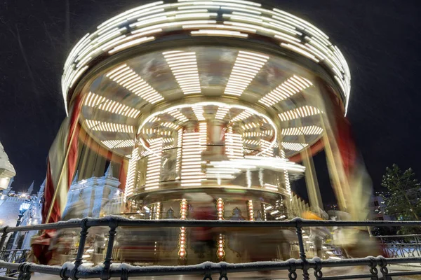 Childrens Christmas carousel in motion. Moscow, Russia — Stock Photo, Image