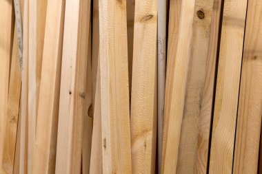 Stack of wooden planks close up