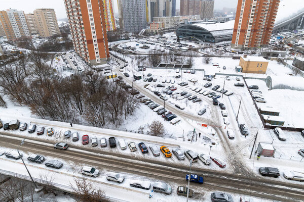 Krasnogorsk, Russia -26 Dec. 2021. Winter top view of road and car park