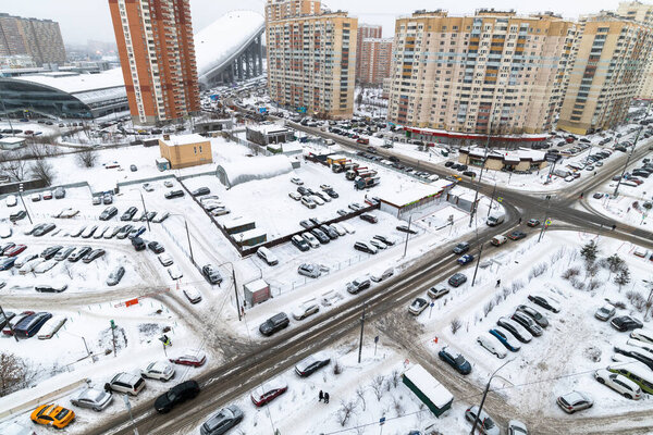 Krasnogorsk, Russia -26 Dec. 2021. Winter top view of road and car park