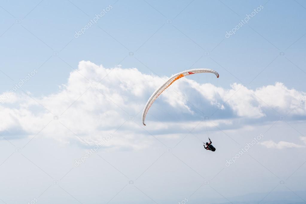 Flying paraglider in the sky