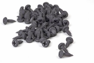 Beyaz üzerinde küçük siyah vida