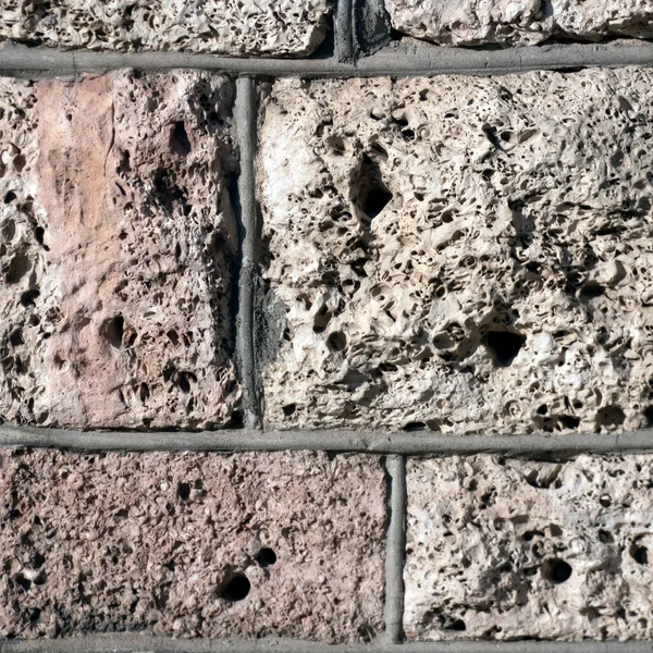 大きな灰色の石で作られた古代の家の壁の断片 スクエアショット — ストック写真