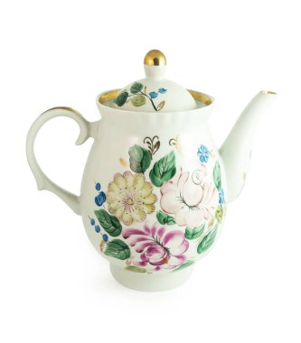 Ceramic teapot with floral pattern isolated on white background. Clipping path included.