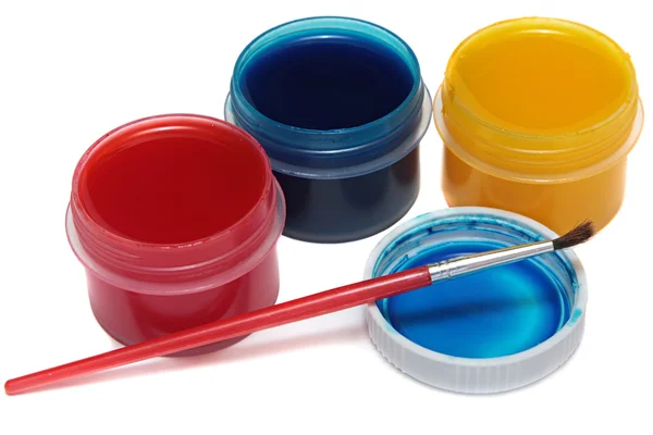 Children's paints in jars and brush — Stock Photo, Image