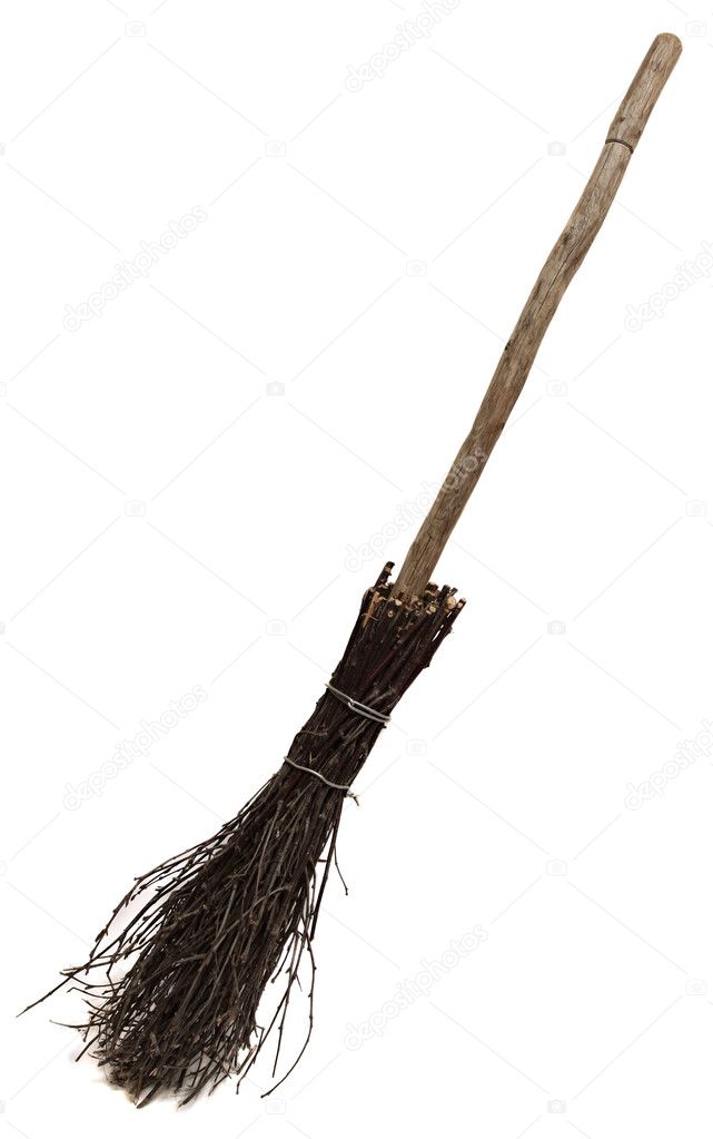 Old wicked broom isolated on white.