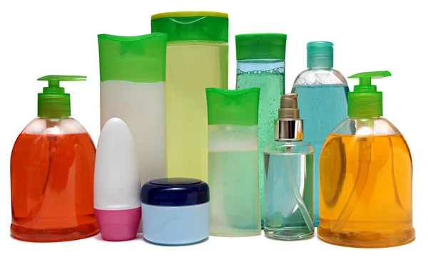 Colored plastic bottles with liquid soap and shower gel. — Stock Photo, Image