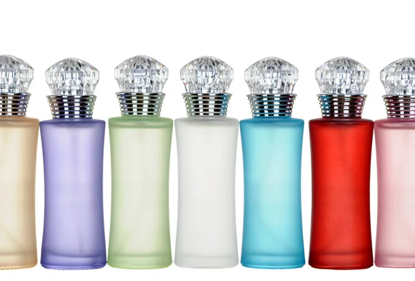 Frascos de vidro colorido de perfume isolado sobre fundo branco . — Fotografia de Stock