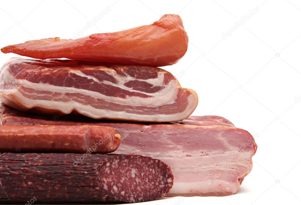 Various smoked meat products, sausage, bacon isolated white background
