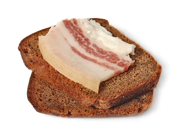 Grasso di maiale salato e pane di segale Borodinsky isolato su sfondo bianco — Foto Stock