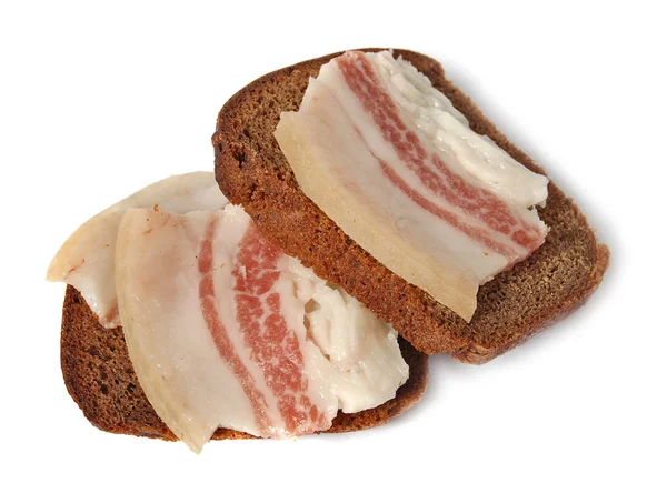 Salted pork fat and Borodinsky rye bread isolated on white background — Stock Image Salted pork fat and Borodinsky rye bread isolated on white background Stock Photo