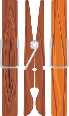 Üç ahşap clothespins üzerinde beyaz izole
