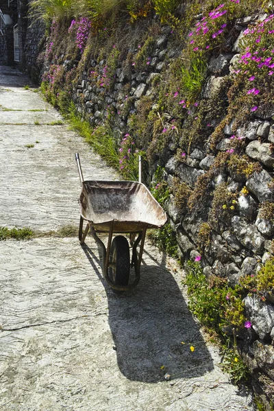 Wheelbarrow in a street — Stock Photo, Image
