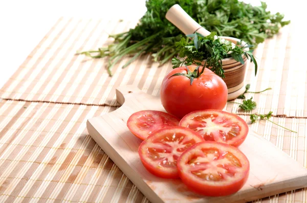 Tomatoes and cilantro — Stock Photo, Image