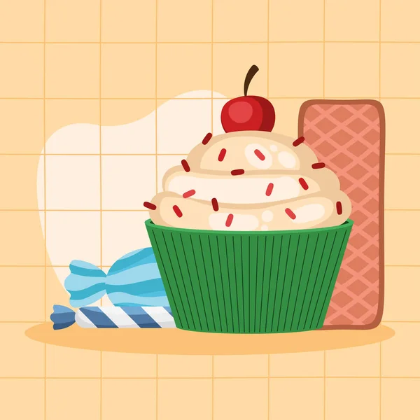 Cupcake und Bonbons — Stockvektor