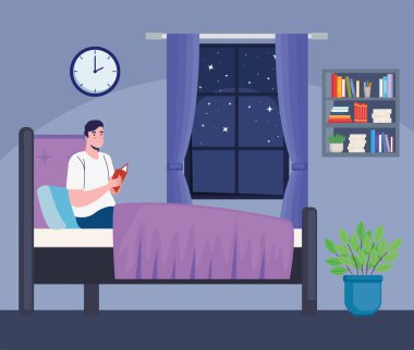 Adam yatak odasında kitap okuyor.