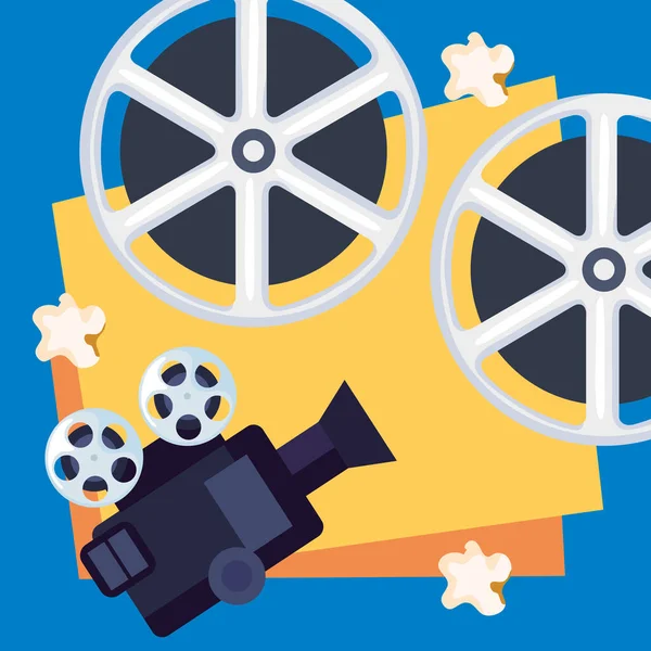 Cinema camera and tape reels — Stockvektor