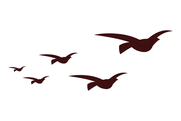 Cinco Pássaros Voando Ícones Silhuetas —  Vetores de Stock
