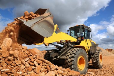 Front End Loader Tipping Stone clipart