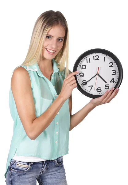 Krásná žena, ukazující na hodiny — Stock fotografie